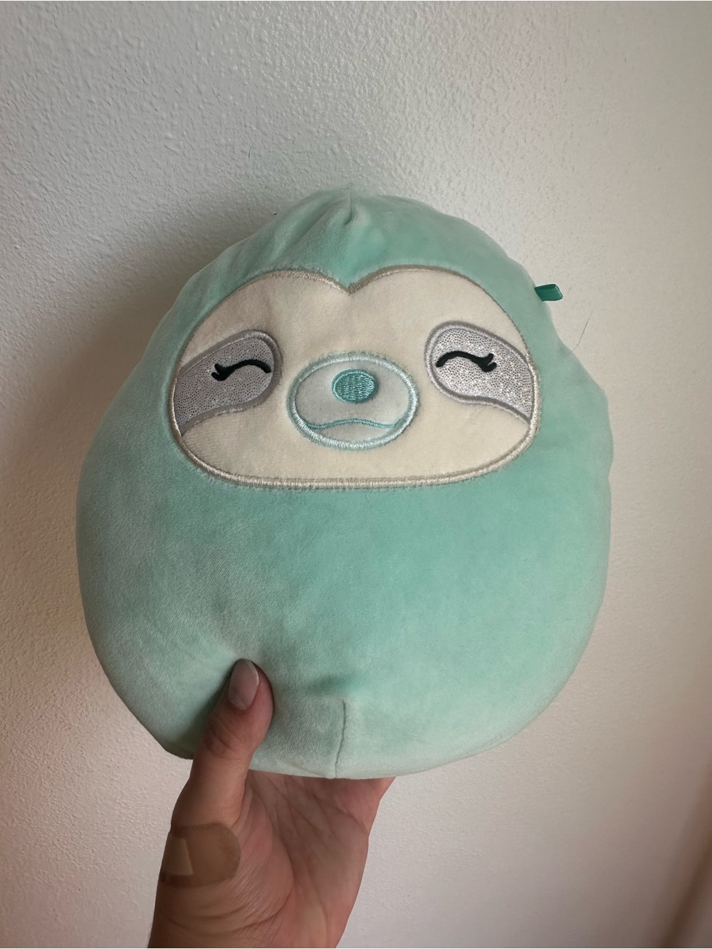 Squishmallow teal sloth